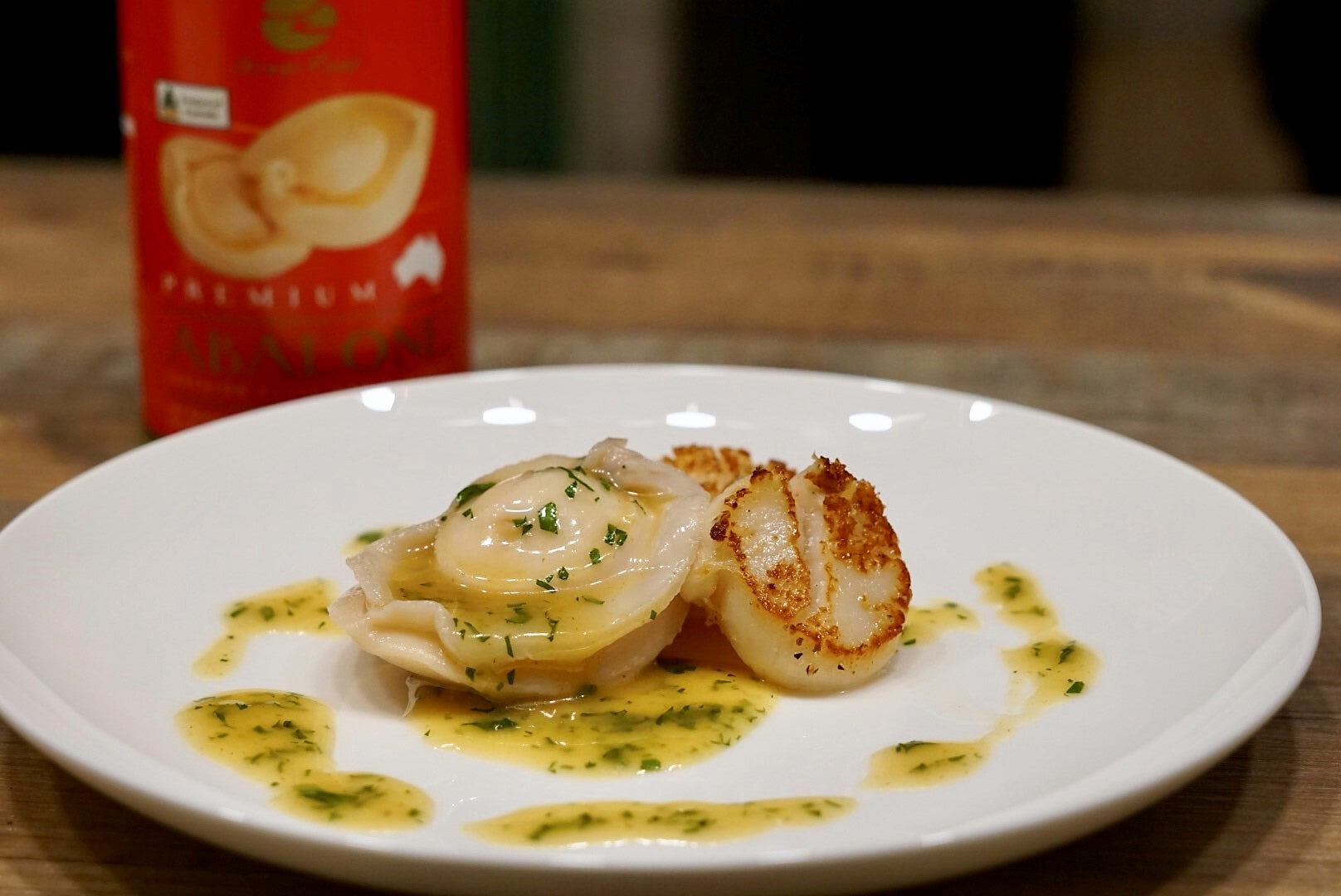 Abalone & scallops served in a scallop & herb sauce